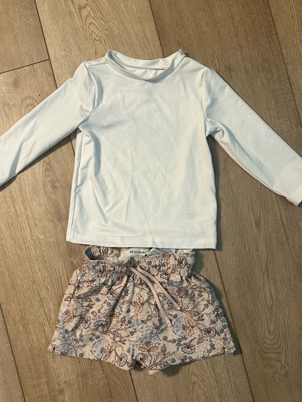 Cat and Jack White Long-Sleeve Rash Guard with H&M Floral Print Swim Shorts